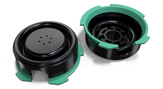 Black and green injection molded parts