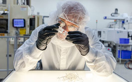 Man inspecting part