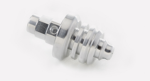 turned aluminum part with sharp edge