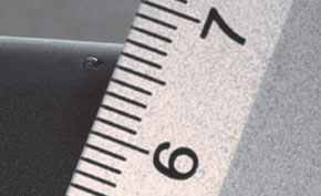 Hot tip gate vestige on plastic part