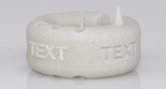 white nylon sls part with text