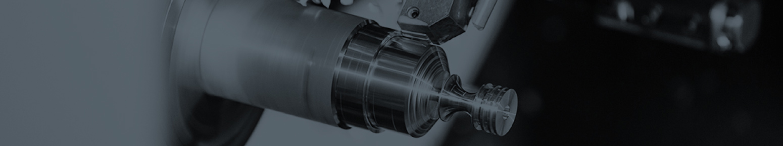 applications engineer examines a part