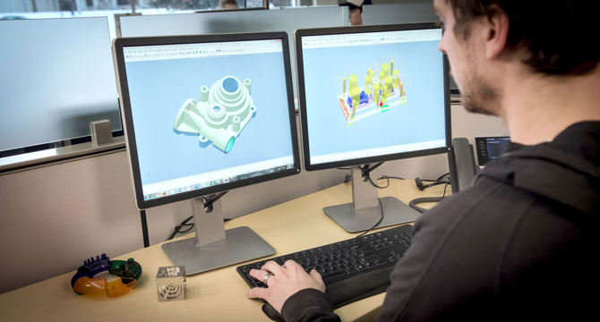 Woman sitting at computer desk